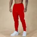 Vibrant red men's high elastic slim fit athletic joggers with drawstring elastic waist - Red