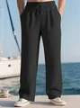 Pantalon plissé noir pour homme avec cordon de serrage dans un cadre nautique côtier - S / Bas / Noir