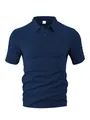 Close-up of the intricate navy blue chevron textured fabric on a men's short sleeve polo shirt - S / Tops / Navy Blue
