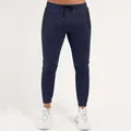 Close-up detail of navy blue men's athletic joggers with zip pockets and ribbed cuffs - S / Bottoms / Navy Blue
