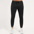 Detailed view of men's black slim fit athletic joggers featuring side zipper pockets - S / Bottoms / Black
