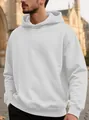 Détail d'un sweat-à-capuche pour homme avec texture et motif jacquard gris clair. - S / Hauts / Blanc