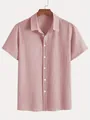 Detalle de una camisa de hombre de manga corta a rayas rojas con textura seersucker - S / Tops / Rojo