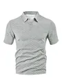 Macro view of the textured waffle jacquard fabric on a gray men's short sleeve polo shirt - Marl Grey