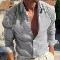 Elegante camisa de manga larga para hombre con rayas verticales blancas y negras y solapa. - 3XL / Tops / Negro