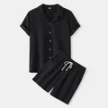 Detail of men's black short sleeve button down shirt and matching drawstring shorts set - S / Top And Bottom / Black