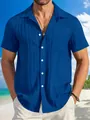 Detalle de una camisa plisada de manga corta para hombre azul con bolsillo frontal - M / Tops / Azul