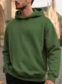 Sweat à capuche pour homme en vert avec tissu jacquard texturé et coupe ample confortable - S / Hauts / Vert Militaire