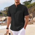Vista detallada de camisa negra de manga corta para hombre con cuello mao y textura gofre - S / Tops / Negro