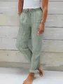 Πλάγια όψη γυναικείου casual χαλαρού βαμβακερού λινά παντελονιού με πράσινες ρίγες. - Πράσινο