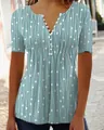 Detail view of trendy V-neck short sleeve shirt with white geometric dots and line print. - S / Tops / Green