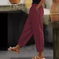 Side view of women's burgundy cotton linen casual pants with elastic waist and pockets - S / Bottoms / Burgundy