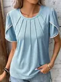 Detail view of light blue pleated t-shirt with delicate pom-pom trim petal sleeves. - S / Tops / Blue
