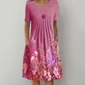 Detail of pink floral print dress showing pockets and pleated round neck design - S / Top And Bottom / Red Butterfly Floral
