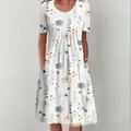 Elegant summer floral print midi dress with round neck and side pockets in white color - S / Bottoms / White