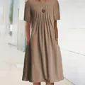 Detail shot of a women's khaki short-sleeved pleated midi dress with side pockets - Brown