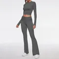 Full view of women's professional grey long sleeve crop top and flared pants yoga set - XS / Top And Bottom / Dark Gray