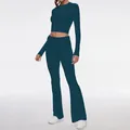 Two-piece activewear set with long sleeve crop top and flared leggings in teal - XS / Top And Bottom / Dark Blue
