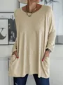Gros plan d'un t-shirt décontracté beige pour femme à col rond et manches longues - Kaki