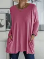Dettaglio di una maglietta rosa ampia a maniche lunghe da donna con tasche laterali. - Taglia S / Top / Rosa Antico