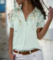 Women's light green short sleeve button-down shirt with floral and bird prints. - S / Tops / T-Shirts / Green
