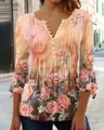 Detailed view of women's V-neck floral print blouse with elegant button and pleat accents - S / 上装(7758) / Orange Pink Flower
