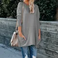 T-shirt décontracté à manches longues et col rond en gris avec poches latérales - S / Hauts / Gris