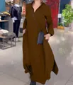Full length view of a loose brown long-sleeved dress with side slits and pockets. - S / Tops / Brown