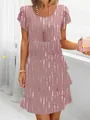 Detail view of a pink tiered chiffon dress with 3D dot print and round neck design. - S / Bottoms / Lotus Water Drop Print