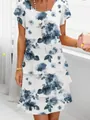 Detailed view of spring chiffon short-sleeve dress featuring elegant blue floral print patterns - S / Top And Bottom / Peacock Blue Floral