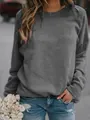 Casual dark gray women's long-sleeve crewneck sweatshirt in outdoor street setting - S / Tops / Gray