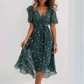 Elegant dark green V-neck floral midi dress with flutter sleeves and ruffled hem - S / Tops / Blue Spot Stone