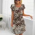 Elegant tiered leopard print chiffon dress with short sleeves and round neck detail - 3XL / Black Leopard