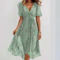 Elegant green floral V-neck dress with short flutter sleeves and a flattering waist tie. - S / Top And Bottom / Pale Green Print