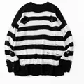 Front view of black and white striped oversized distressed knit sweater with crew neck - S / Tops / Black & White Stripes