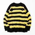 Oversized yellow and black striped knit sweater with distressed ripped hole details - S / Tops / Black and Yellow Stripes