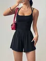 Detail view of a stylish black summer halter romper with wide-leg shorts and gathered waist - XS / Top And Bottom / Black