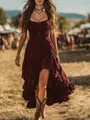 Bohemian burgundy smocked high-low ruffled dress worn by a model in a sunlit field - S / Tops / Dark Red