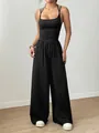 Chic black halter neck jumpsuit featuring comfortable wide-leg trousers for summer wear - XS / Top And Bottom (X8) / Black