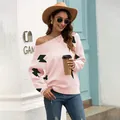 Stylish women's pink long sleeve knit sweater with black lightning bolt pattern - S / Tops / Pink
