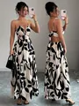 Detailed view of floral print backless maxi dress showing front and side profile - S / Top And Bottom / White