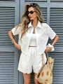 Detailed view of woman in white eyelet shirt and shorts set with summer straw bag - S / Top And Bottom / White