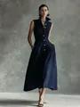 Detail view of a stylish navy blue sleeveless button-down maxi dress with a classic collar. - Dark Blue