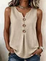 Close-up view of a women's V-neck cotton linen tank top with decorative large brown buttons - Apricot
