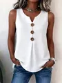 Close-up detail of the white cotton linen fabric texture and decorative buttons. - S / Tops / White