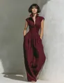 Full view of elegant burgundy sleeveless wide-leg jumpsuit with v-neck and high collar design - XS / Top And Bottom / Burgundy