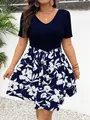 Detailed view of plus size V-neck patchwork dress with navy floral print skirt - 0XL / Top And Bottom / Dark Blue