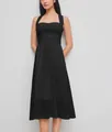Robe midi noire élégante de style français sans manches avec taille cintrée et coupe trapèze. - XS / Haut Et Bas / Noir