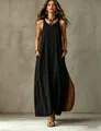Full-body view of a black sleeveless maxi dress with pockets and styling - S / Tops / Black