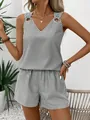 Detail view of women's striped sleeveless V-neck top and high-waist casual shorts set - S / Top And Bottom / Black